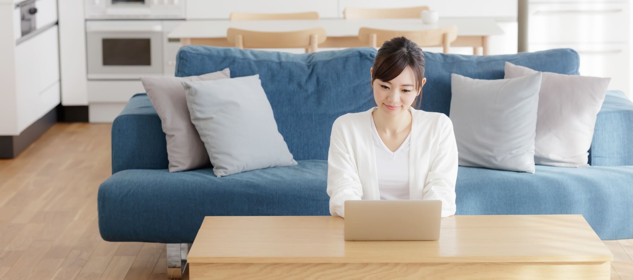 woman working on her computer at home