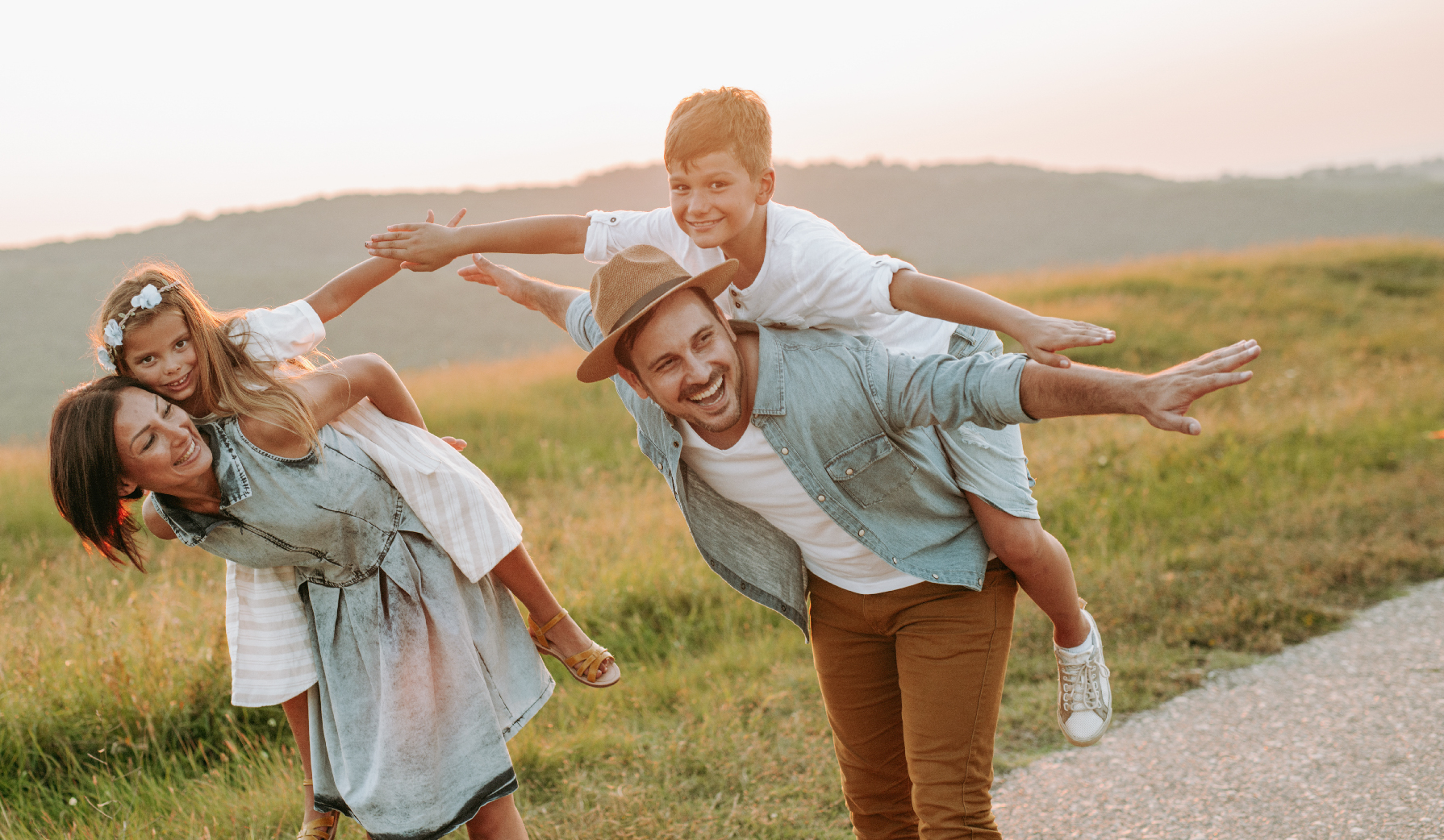 family with children on their packs