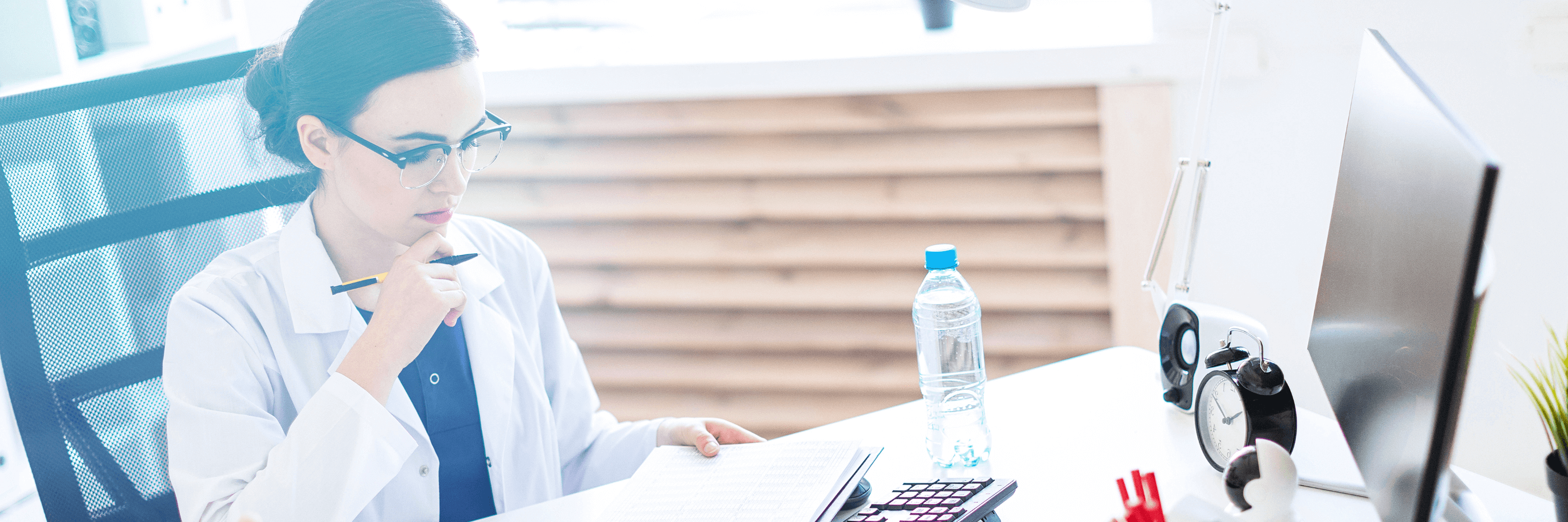 dentist working on computer