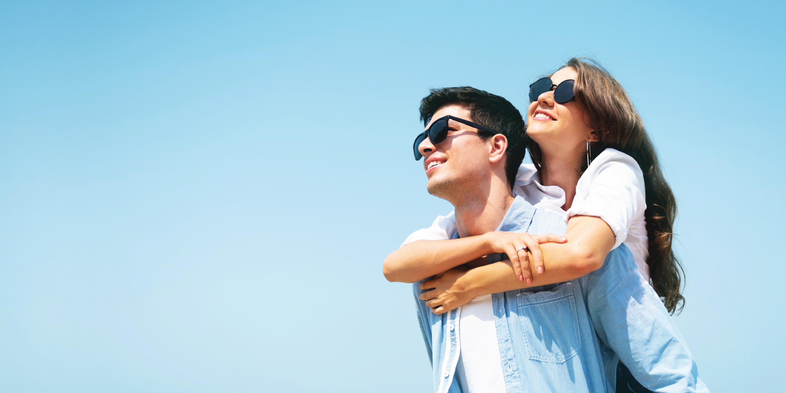 Couple wearing sunglasses on a sunny day