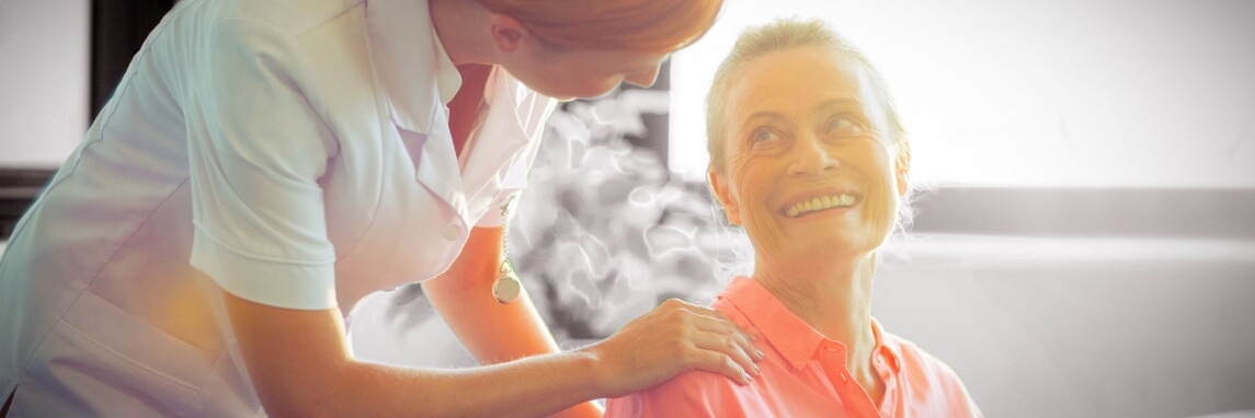 dentist assistant tending to elderly woman